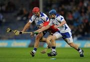 17 July 2010; Ray Ryan, Cork, in action against Seamus Prendergast, left, and Shane Walsh, Waterford. Munster GAA Hurling Senior Championship Final Replay, Cork v Waterford, Semple Stadium, Thurles, Co. Tipperary. Picture credit: Ray McManus / SPORTSFILE