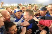 17 July 2010; Waterford manager Davy Fitzgerald celebrates with Waterford supporters after the game. Munster GAA Hurling Senior Championship Final Replay, Cork v Waterford, Semple Stadium, Thurles, Co. Tipperary. Picture credit: Ray McManus / SPORTSFILE