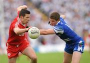 18 July 2010; Sean Cavanagh, Tyrone, in action against Darren Hughes, Monaghan. Ulster GAA Football Senior Championship Final, Monaghan v Tyrone, St Tighearnach's Park, Clones, Co. Monaghan. Picture credit: Oliver McVeigh / SPORTSFILE