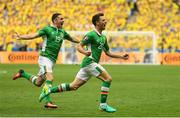13 June 2016; Wes Hoolahan of Republic of Ireland celebrates after scoring his side's first goal with team-mate Robbie Brady, left, during the UEFA Euro 2016 Group E match between Republic of Ireland and Sweden at Stade de France in Saint Denis, Paris, France. Photo by Stephen McCarthy/Sportsfile