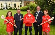 15 June 2016; Tim Barry Murphy, left, and Peadar Deegan from New Ireland Assurance pictured with Cork camogie players Orla Cronin, Ashling Thompson, and Meabh Cahalane as New Ireland announces Sponsorship agreement with Cork Camogie. Maryborough Hotel, Cork Photo by Diarmuid Greene/Sportsfile