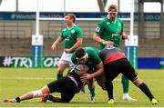 15 June 2016; Sean O'Connor of Ireland is tackled during the World Rugby U-20 Championships match between Ireland and Georgia at Manchester City Academy Stadium in Manchester, England. Photo by Matt McNulty/Sportsfile