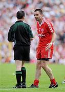 18 July 2010; Ryan McMenamin, Tyrone, has a quiet word with referee David Coldrick. Ulster GAA Football Senior Championship Final, Monaghan v Tyrone, St Tighearnach's Park, Clones, Co. Monaghan. Picture credit: Oliver McVeigh / SPORTSFILE