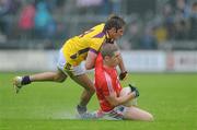 18 July 2010; Daniel Goulding, Cork, in action against Brian Malone, Wexford. GAA Football All-Ireland Senior Championship Qualifier Round 3, Wexford v Cork, Wexford Park, Wexford. Picture credit: Matt Browne / SPORTSFILE