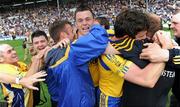 18 July 2010; Donal Shine, Roscommon, is congratulated after the game by teammates and supporters. Connacht GAA Football Senior Championship Final, Roscommon v Sligo, McHale Park, Castlebar, Co. Mayo. Picture credit: Ray Ryan / SPORTSFILE