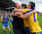 18 July 2010; Donal Shine, Roscommon, is congratulated after the game by manager Fergal O'Donnell. Connacht GAA Football Senior Championship Final, Roscommon v Sligo, McHale Park, Castlebar, Co. Mayo. Picture credit: Ray Ryan / SPORTSFILE
