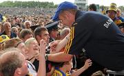 18 July 2010; Roscommon manager Fergal O'Donnell is congratulated by supporters, including his wife Marie. Connacht GAA Football Senior Championship Final, Roscommon v Sligo, McHale Park, Castlebar, Co. Mayo. Picture credit: Ray Ryan / SPORTSFILE