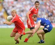 18 July 2010; Owen Mulligan, Tyrone, in action against Dermot McArdle, Monaghan. Ulster GAA Football Senior Championship Final, Monaghan v Tyrone, St Tighearnach's Park, Clones, Co. Monaghan. Picture credit: Oliver McVeigh / SPORTSFILE