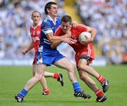 18 July 2010; Philip Jordan, Tyrone, in action against Gary McQuaid, Monaghan. Ulster GAA Football Senior Championship Final, Monaghan v Tyrone, St Tighearnach's Park, Clones, Co. Monaghan. Picture credit: Oliver McVeigh / SPORTSFILE