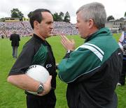 18 July 2010; Referee David Coldrick speaks with sideline official Jimmy McKee before the game. Ulster GAA Football Senior Championship Final, Monaghan v Tyrone, St Tighearnach's Park, Clones, Co. Monaghan. Picture credit: Oliver McVeigh / SPORTSFILE