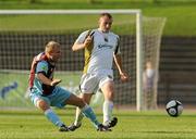 19 July 2010; Kenny Browne, Sporting Fingal, in action against John Flood, Drogheda United. Airtricity League Premier Division, Sporting Fingal v Drogheda United, Morton Stadium, Santry, Dublin. Picture credit: Barry Cregg / SPORTSFILE