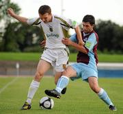 19 July 2010; Conan Byrne, Sporting Fingal, is tackled by Eoghan Osbourne, Drogheda United. Airtricity League Premier Division, Sporting Fingal v Drogheda United, Morton Stadium, Santry, Dublin. Picture credit: Barry Cregg / SPORTSFILE