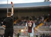 19 July 2010; Referee Derek Tomney shows the red card to Drogheda United's Eoghan Osbourne. Airtricity League Premier Division, Sporting Fingal v Drogheda United, Morton Stadium, Santry, Dublin. Picture credit: Barry Cregg / SPORTSFILE