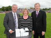 18 July 2010; Ulster GAA President Aoghan Farrell, left, and GAA Director General Páraic Duffy, right, with Shirley Burden daughter of Eamon McKay, honoured as a member of the Down Jubilee teams of 1960-61, during the Ulster GAA Football Finals. St Tighearnach's Park, Clones, Co. Monaghan. Picture credit: Oliver McVeigh / SPORTSFILE