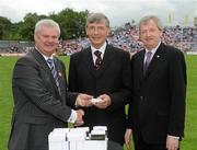 18 July 2010; Ulster GAA President Aoghan Farrell, left, and GAA Director General Páraic Duffy, right, with Dan McCartan, honoured as a member of the Down Jubilee teams of 1960-61, during the Ulster GAA Football Finals. St Tighearnach's Park, Clones, Co. Monaghan. Picture credit: Oliver McVeigh / SPORTSFILE