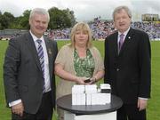 18 July 2010; Ulster GAA President Aoghan Farrell, left, and GAA Director General Páraic Duffy, right, with Patricia McKibben daughter of the late Pat Rice, honoured as a member of the Down Jubilee teams of 1960-61, during the Ulster GAA Football Finals. St Tighearnach's Park, Clones, Co. Monaghan. Picture credit: Oliver McVeigh / SPORTSFILE