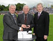 18 July 2010; Ulster GAA President Aoghan Farrell, left, and GAA Director General Páraic Duffy, right, with Kevin O'Neill, honoured as a member of the Down Jubilee teams of 1960-61, during the Ulster GAA Football Finals. St Tighearnach's Park, Clones, Co. Monaghan. Picture credit: Oliver McVeigh / SPORTSFILE