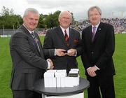 18 July 2010; Ulster GAA President Aoghan Farrell, left, and GAA Director General Páraic Duffy, right, with Sean O'Neill, honoured as a member of the Down Jubilee teams of 1960-61, during the Ulster GAA Football Finals. St Tighearnach's Park, Clones, Co. Monaghan. Picture credit: Oliver McVeigh / SPORTSFILE