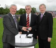 18 July 2010; Ulster GAA President Aoghan Farrell, left, and GAA Director General Páraic Duffy, right, with James McCartan, honoured as a member of the Down Jubilee teams of 1960-61, during the Ulster GAA Football Finals. St Tighearnach's Park, Clones, Co. Monaghan. Picture credit: Oliver McVeigh / SPORTSFILE