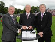 18 July 2010; Ulster GAA President Aoghan Farrell, left, and GAA Director General Páraic Duffy, right, with Kieran Denvir, honoured as a member of the Down Jubilee teams of 1960-61, during the Ulster GAA Football Finals. St Tighearnach's Park, Clones, Co. Monaghan. Picture credit: Oliver McVeigh / SPORTSFILE