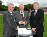 18 July 2010; Ulster GAA President Aoghan Farrell, left, and GAA Director General Páraic Duffy, right, with John Smith, honoured as a member of the Down Jubilee teams of 1960-61, during the Ulster GAA Football Finals. St Tighearnach's Park, Clones, Co. Monaghan. Picture credit: Oliver McVeigh / SPORTSFILE