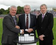 18 July 2010; Ulster GAA President Aoghan Farrell, left, and GAA Director General Páraic Duffy, right, with PJ McElroy, honoured as a member of the Down Jubilee teams of 1960-61, during the Ulster GAA Football Finals. St Tighearnach's Park, Clones, Co. Monaghan. Picture credit: Oliver McVeigh / SPORTSFILE