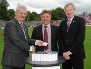 18 July 2010; Ulster GAA President Aoghan Farrell, left, and GAA Director General Páraic Duffy, right, with Declan McConaghy nephew of Eamon Burns, honoured as a member of the Down Jubilee teams of 1960-61, during the Ulster GAA Football Finals. St Tighearnach's Park, Clones, Co. Monaghan. Picture credit: Oliver McVeigh / SPORTSFILE