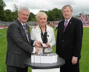 18 July 2010; Ulster GAA President Aoghan Farrell, left, and GAA Director General Páraic Duffy, right, with Patricia Conlon sister of the late John MacAuley, honoured as a member of the Down Jubilee teams of 1960-61, during the Ulster GAA Football Finals. St Tighearnach's Park, Clones, Co. Monaghan. Picture credit: Oliver McVeigh / SPORTSFILE