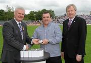 18 July 2010; Ulster GAA President Aoghan Farrell, left, and GAA Director General Páraic Duffy, right, with Kevin Kennedy son of the late Seamus Kennedy, honoured as a member of the Down Jubilee teams of 1960-61, during the Ulster GAA Football Finals. St Tighearnach's Park, Clones, Co. Monaghan. Picture credit: Oliver McVeigh / SPORTSFILE