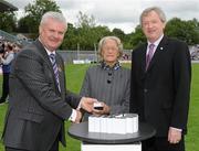 18 July 2010; Ulster GAA President Aoghan Farrell, left, and GAA Director General Páraic Duffy, right, with Peig Denvir wife of the late Brian Denvir, honoured as a member of the Down Jubilee teams of 1960-61, during the Ulster GAA Football Finals. St Tighearnach's Park, Clones, Co. Monaghan. Picture credit: Oliver McVeigh / SPORTSFILE