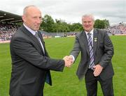 18 July 2010; Ulster GAA President Aoghan Farrell, right, with Eugene Sherry, honoured as a Captain of the Monaghan Jubilee team of 1985, during the Ulster GAA Football Finals. St Tighearnach's Park, Clones, Co. Monaghan. Picture credit: Oliver McVeigh / SPORTSFILE