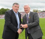 18 July 2010; Ulster GAA President Aoghan Farrell, right, with Gerry McCarville, honoured as a Captain of the Monaghan Jubilee team of 1985, during the Ulster GAA Football Finals. St Tighearnach's Park, Clones, Co. Monaghan. Picture credit: Oliver McVeigh / SPORTSFILE