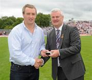 18 July 2010; Ulster GAA President Aoghan Farrell, right, with Fergus Caulfield, honoured as a Captain of the Monaghan Jubilee team of 1985, during the Ulster GAA Football Finals. St Tighearnach's Park, Clones, Co. Monaghan. Picture credit: Oliver McVeigh / SPORTSFILE