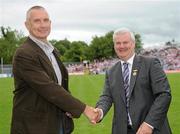 18 July 2010; Ulster GAA President Aoghan Farrell, right, with David Byrne, honoured as a Captain of the Monaghan Jubilee team of 1985, during the Ulster GAA Football Finals. St Tighearnach's Park, Clones, Co. Monaghan. Picture credit: Oliver McVeigh / SPORTSFILE