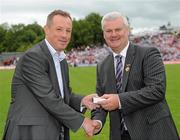 18 July 2010; Ulster GAA President Aoghan Farrell, right, with Michael O'Dowd, honoured as a Captain of the Monaghan Jubilee team of 1985, during the Ulster GAA Football Finals. St Tighearnach's Park, Clones, Co. Monaghan. Picture credit: Oliver McVeigh / SPORTSFILE