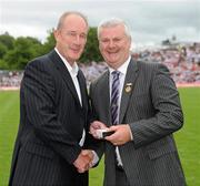 18 July 2010; Ulster GAA President Aoghan Farrell, right, with Eamonn McEnaney, honoured as a Captain of the Monaghan Jubilee team of 1985, during the Ulster GAA Football Finals. St Tighearnach's Park, Clones, Co. Monaghan. Picture credit: Oliver McVeigh / SPORTSFILE