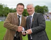 18 July 2010; Ulster GAA President Aoghan Farrell, right, with Michael Caulfield, honoured as a Captain of the Monaghan Jubilee team of 1985, during the Ulster GAA Football Finals. St Tighearnach's Park, Clones, Co. Monaghan. Picture credit: Oliver McVeigh / SPORTSFILE