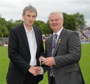 18 July 2010; Ulster GAA President Aoghan Farrell, right, with Eugene O'Hanlon, honoured as a Captain of the Monaghan Jubilee team of 1985, during the Ulster GAA Football Finals. St Tighearnach's Park, Clones, Co. Monaghan. Picture credit: Oliver McVeigh / SPORTSFILE