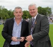 18 July 2010; Ulster GAA President Aoghan Farrell, right, with Noel Shields, honoured as a Captain of the Monaghan Jubilee team of 1985, during the Ulster GAA Football Finals. St Tighearnach's Park, Clones, Co. Monaghan. Picture credit: Oliver McVeigh / SPORTSFILE