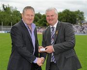18 July 2010; Ulster GAA President Aoghan Farrell, right, with Bernie Murray, honoured as a Captain of the Monaghan Jubilee team of 1985, during the Ulster GAA Football Finals. St Tighearnach's Park, Clones, Co. Monaghan. Picture credit: Oliver McVeigh / SPORTSFILE