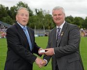 18 July 2010; Ulster GAA President Aoghan Farrell, right, with Paddy Tavey, honoured as a Captain of the Monaghan Jubilee team of 1985, during the Ulster GAA Football Finals. St Tighearnach's Park, Clones, Co. Monaghan. Picture credit: Oliver McVeigh / SPORTSFILE *