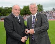 18 July 2010; Ulster GAA President Aoghan Farrell, right, with Jimmy Kiely, honoured as a Captain of the Monaghan Jubilee team of 1985, during the Ulster GAA Football Finals. St Tighearnach's Park, Clones, Co. Monaghan. Picture credit: Oliver McVeigh / SPORTSFILE *