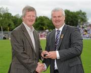 18 July 2010; Ulster GAA President Aoghan Farrell, right, with John Joe McKearney, honoured as a Captain of the Monaghan Jubilee team of 1985, during the Ulster GAA Football Finals. St Tighearnach's Park, Clones, Co. Monaghan. Picture credit: Oliver McVeigh / SPORTSFILE *