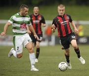 20 July 2010; Paddy Brennan, Bohemians, in action against Danny Holmes, The New Saints FC. UEFA Champions League First Qualifying Round, 2nd Leg, The New Saints FC v Bohemians, Park Hall Stadium, Oswestry, Wales. Picture credit: David Maher / SPORTSFILE