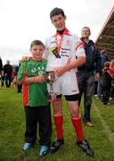 4 July 2010; Jonathon McGowan, captain Moy Davitts, Mayo, with his brother Niall after beating Stradbally, Laois in the Division 2 Boys Final. Coca-Cola GAA Féile Peil na nÓg Finals 2010, Celtic Park, Derry. Photo by Sportsfile