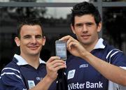 21 July 2010; Ulster Bank GAA stars launched the new Ulster Bank GAA iPhone app which offers a host of match-day information, from breaking news to your nearest ATM, enabling GAA fans to make the most of their match-day experience. The app is part of Ulster Bank’s digital campaign for their sponsorship of the GAA Football All-Ireland Championship which also sees behind the scenes videos of the players available on www.ulsterbank.com/gaa and on www.facebook.com/UlsterBankGAA. At the launch is Down footballer Danny Hughes, left, and Dublin footballer Cian O'Sullivan. Ulster Bank, George’s Quay, Dublin. Picture credit: Brian Lawless / SPORTSFILE