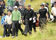 21 July 2010; Golfers Darren Clarke, centre, Padraig Harrington, left, and Rory McIlroy, right, leaving the third tee during the 2010 Lough Erne Challenge. Lough Erne Resort, Enniskillen, Co. Fermanagh. Picture credit: Oliver McVeigh / SPORTSFILE
