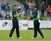 16 June 2016; Ireland captain William Porterfield, right, in conversation with team-mate Kevin O’Brien during the One Day International match between Ireland and Sri Lanka at Malahide Cricket Ground in Malahide, Dublin. Photo by Seb Daly/Sportsfile