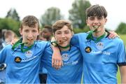 17 June 2016; DDSL players Brandon Holt, Alex Dunne and Troy Parrott, all of Belvedere FC, celebrate with their medals after defeating Galway in a penalty shootout AET in the SFAI Kennedy Cup Final at University of Limerick in Limerick. Photo by Diarmuid Greene/Sportsfile