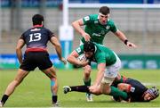 15 June 2016; Evan Mintern of Ireland is tackled during the World Rugby U-20 Championships match between Ireland and Georgia at Manchester City Academy Stadium in Manchester, England. Photo by Matt McNulty/Sportsfile